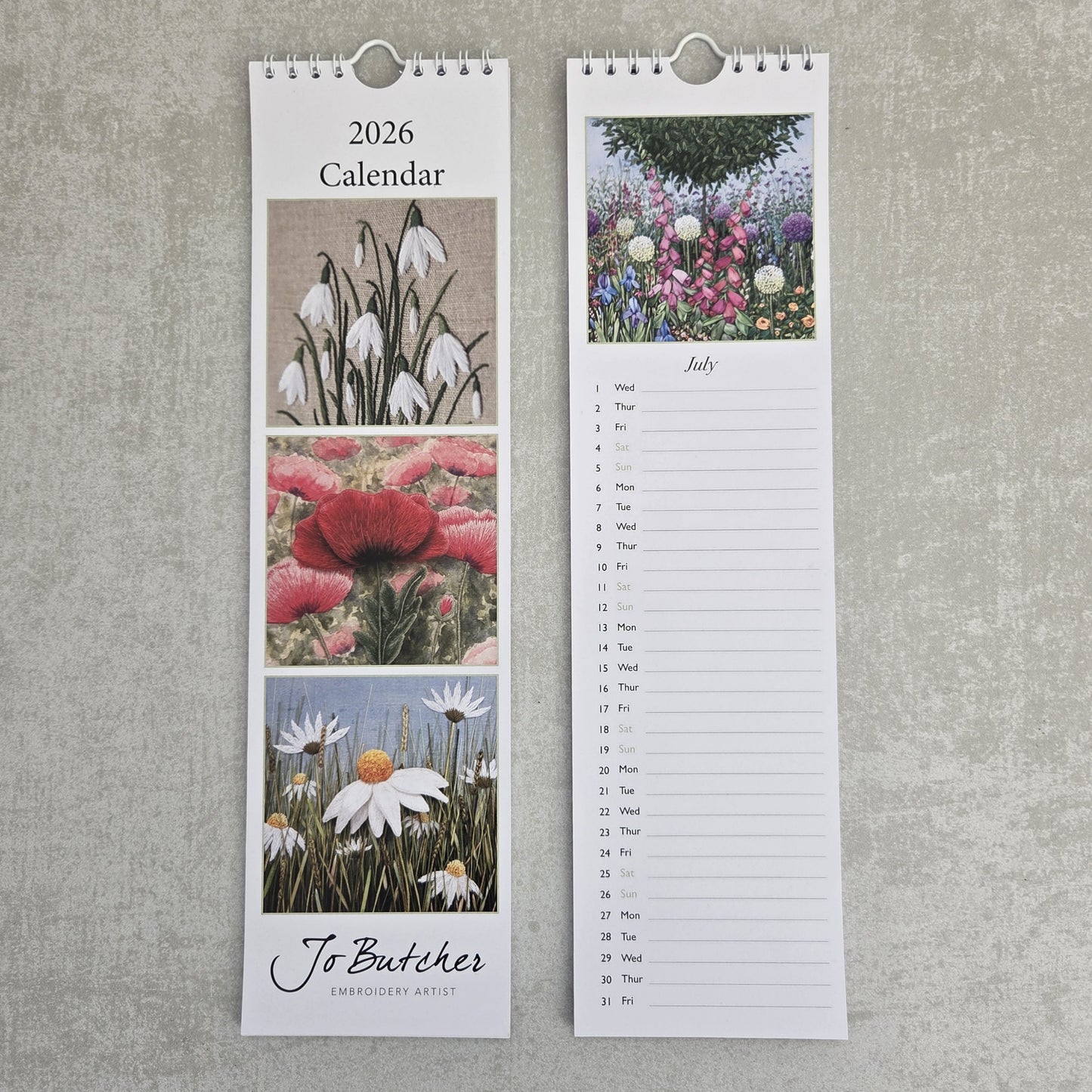 Tall vertical calendar with floral designs