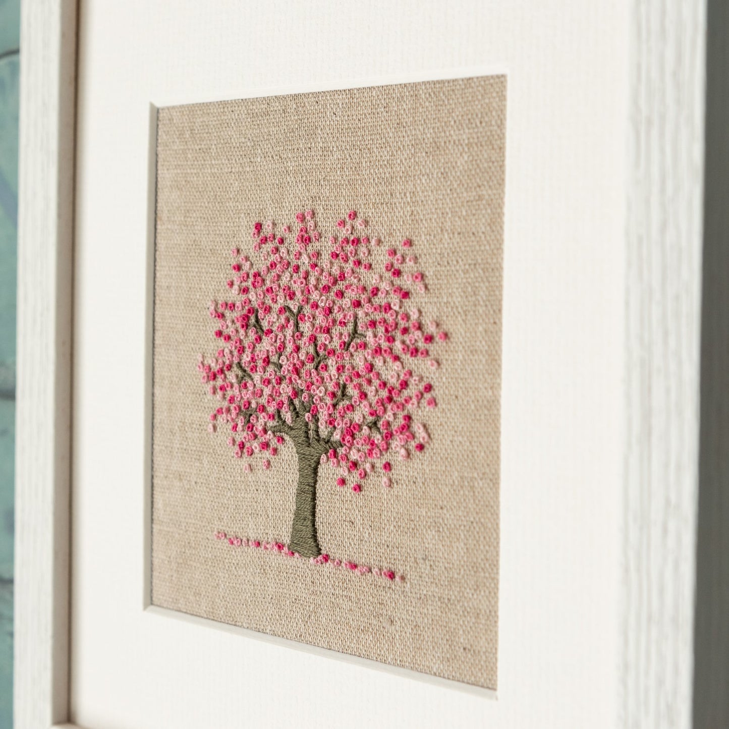 Framed cherry tree in full pink blossom