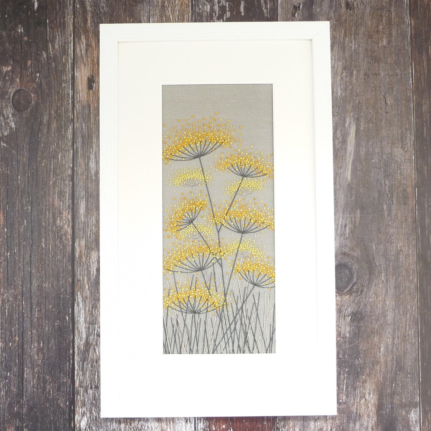 completed yellow and grey fennel kit in white frame and mount.