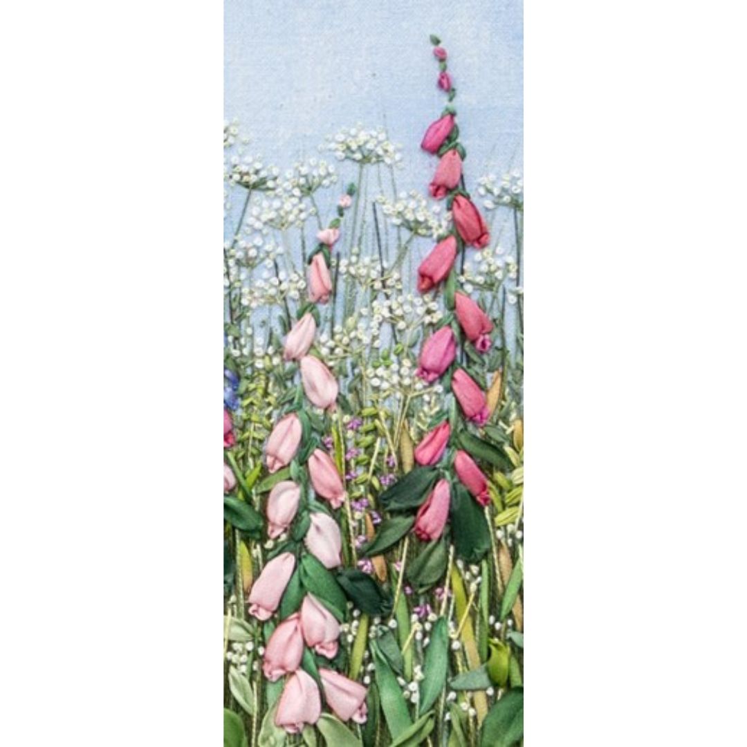 Foxglove spires and foliage embroidered using silk ribbons with cow parsley, grass and smaller flowers embroidered using cottons.