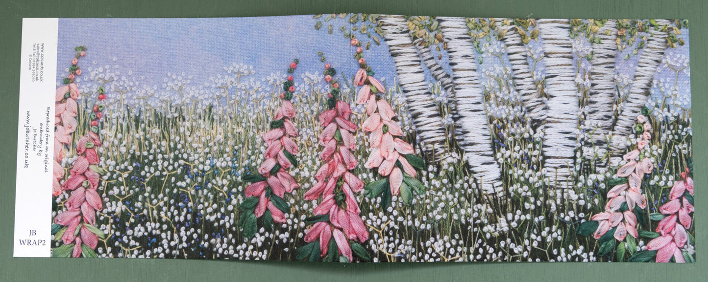 a clump of birches, foxgloves and flowers greeting card with the images wrapping around the front and back.