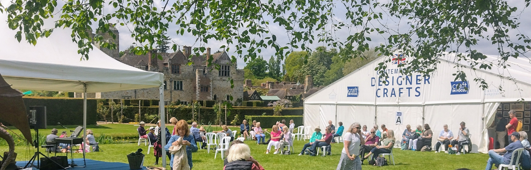 craft show marquee on grass in front of Hever castle