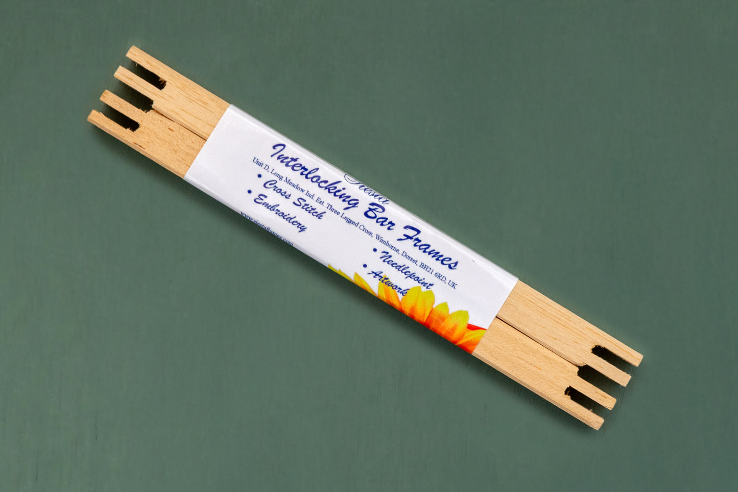 a pair of interlocking wooded bars used to form one half of a square or rectangle.  Used to pin your embroidery background to in order to keep it taut.