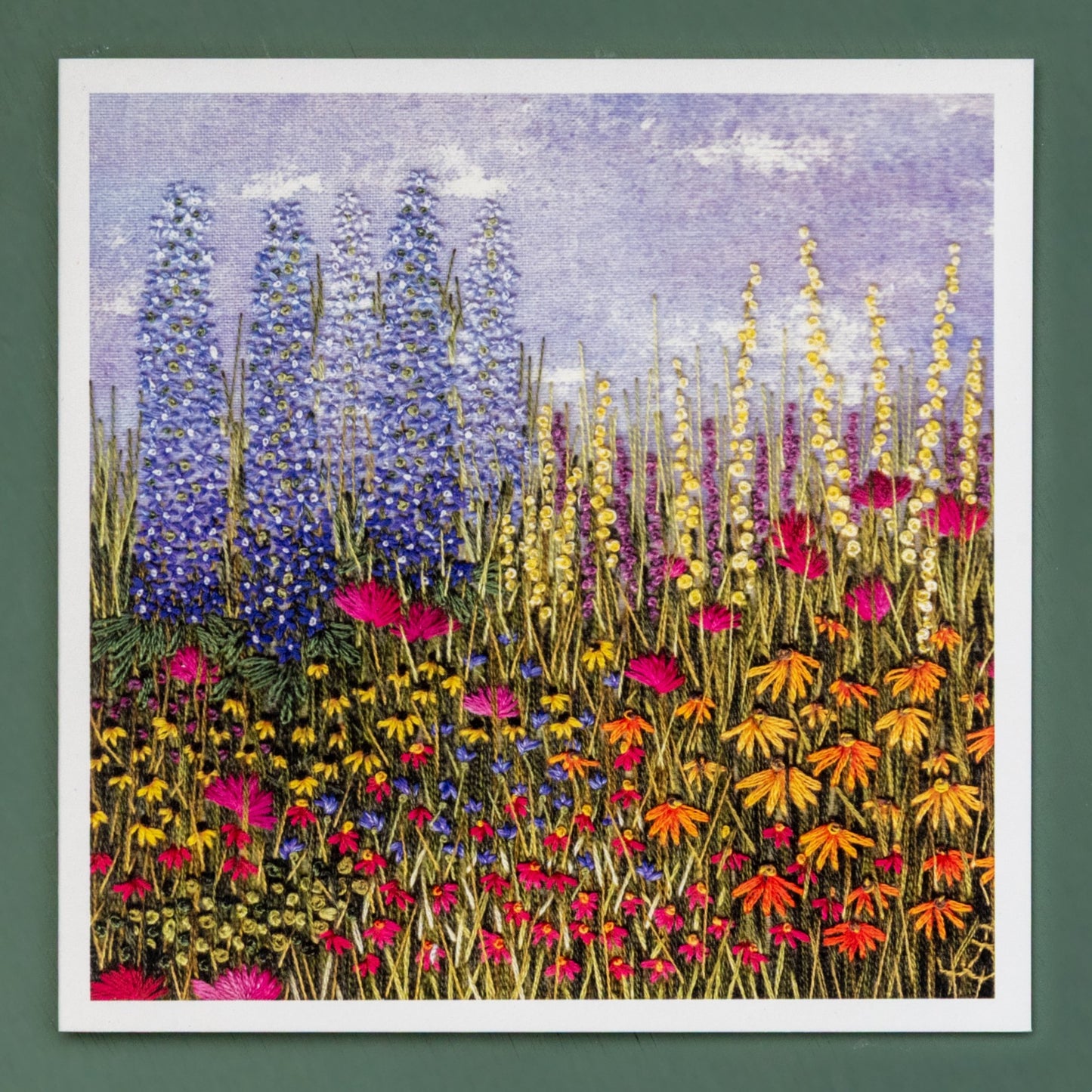 square card of a orange and red flower border