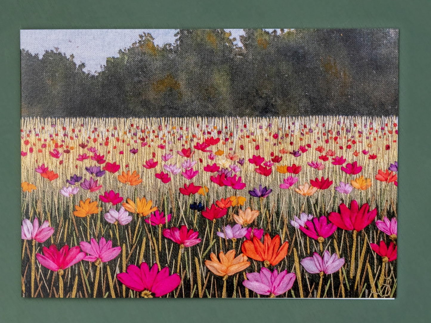 A summer meadow full of bright poppies receding into the distance.