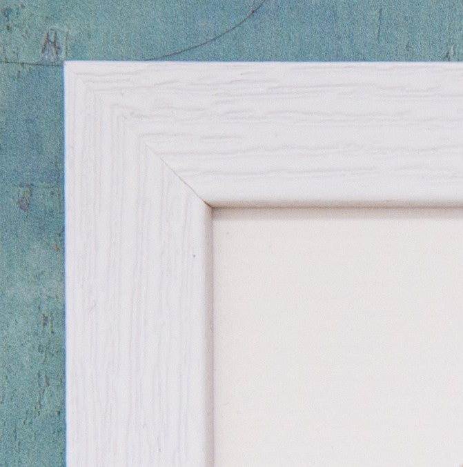 Top left corner of a white wooden frame.