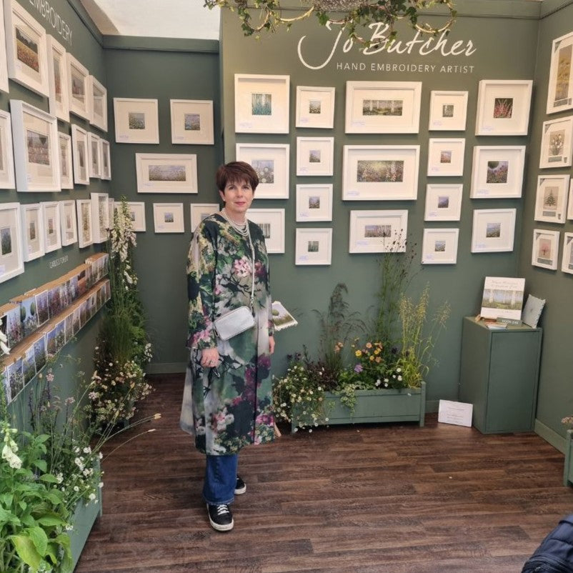 Jo butcher standing on her RHS Chelsea flower show stand