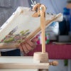 A desk clamped working frame holding a hand embroidery by Jo Butcher