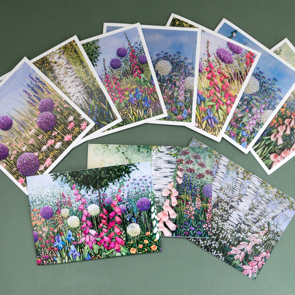 A selection of 10 greeting cards fanned out so they can be seen.